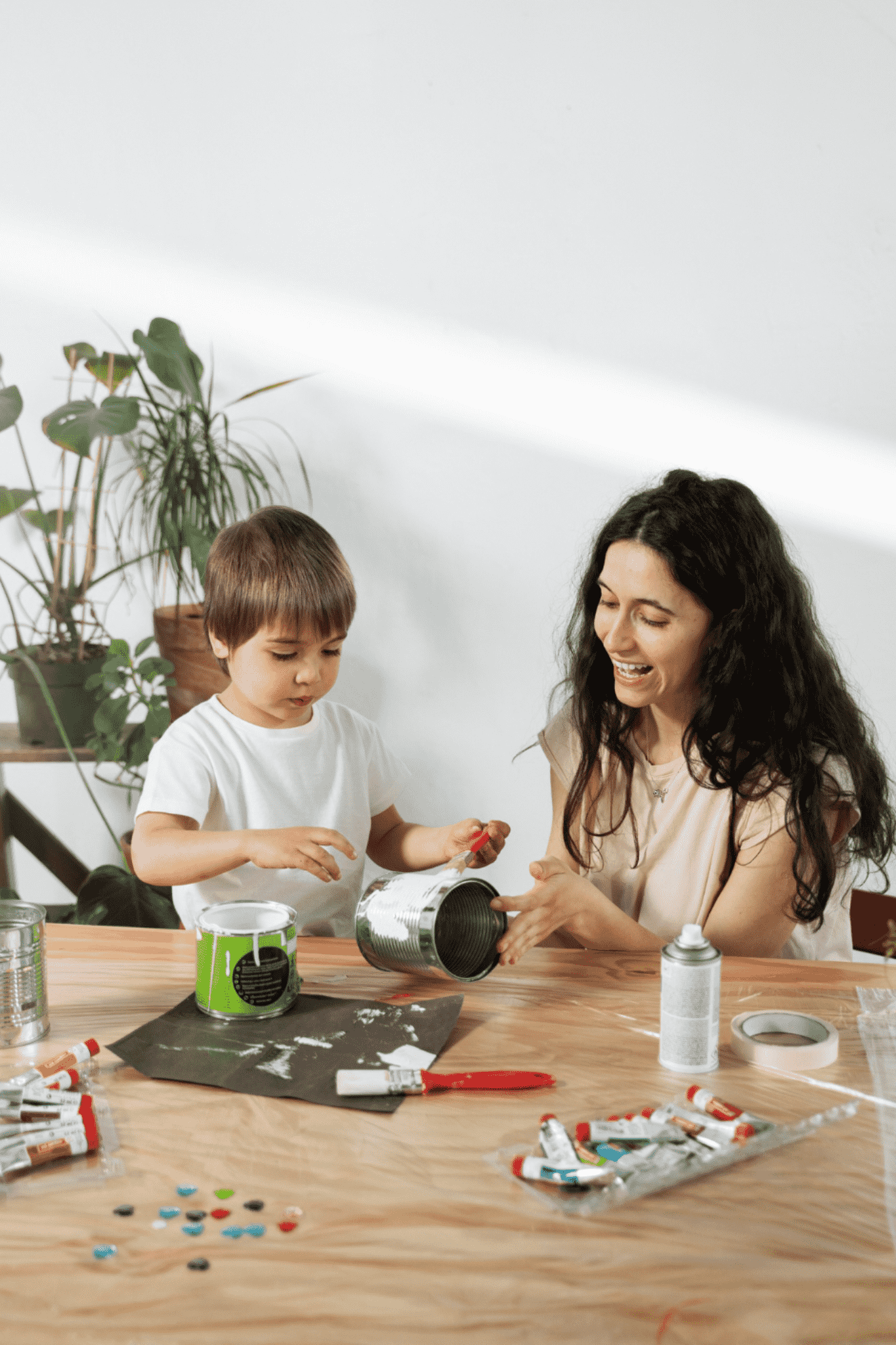 mom showing kid how reuse materials creative ways